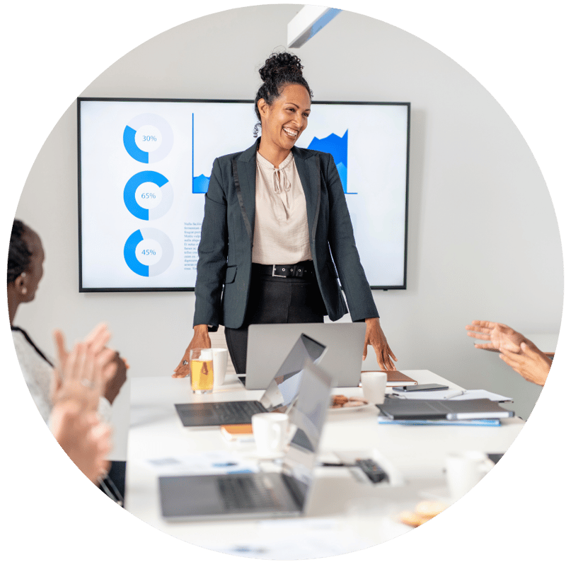 business woman giving presentation after earning her DBA